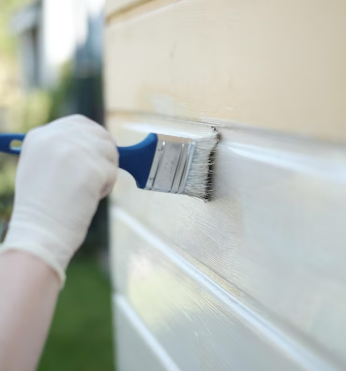 close-up-hand-holding-paint-brush-while-painting-wood-with-white-lacquer_1048944-20212170 close-up-hand-holding-paint-brush-while-painting-wood-with-white-lacquer_1048944-20212170